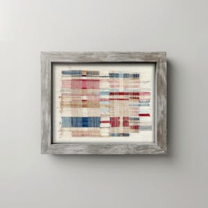 Grid pattern fabric artwork picture for living room — aged textile with cream, navy, and coral tones