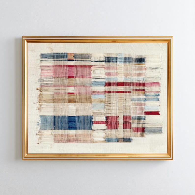 May include: A framed textile wall art piece featuring a grid of woven threads in shades of red, blue, and beige. The composition consists of horizontal and vertical lines creating a textured, layered appearance within a thin gold-colored frame.