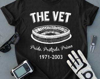 Camiseta vintage do Philadelphia Vet Stadium, orgulho de torcedor do Philadelphia Eagles e do Phillies, pretzels, estilo retrô esportivo.