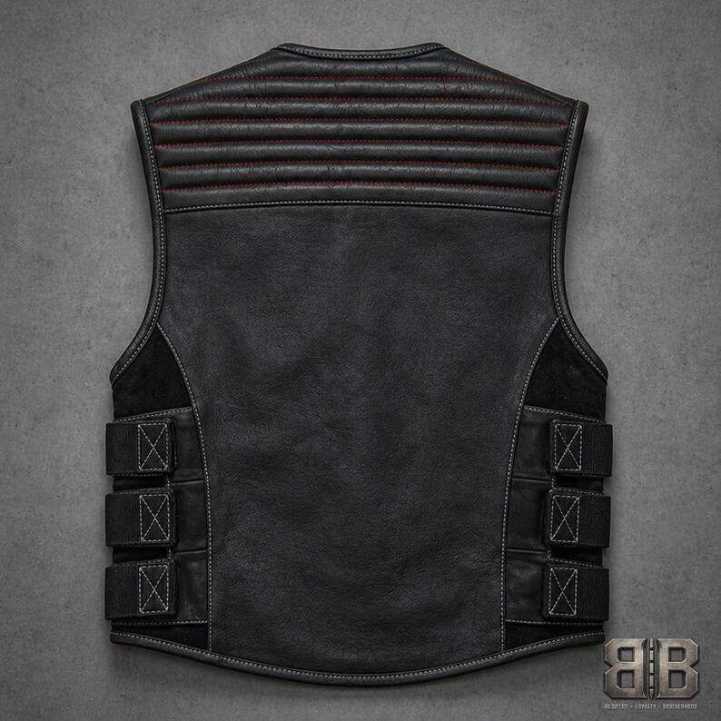Back view of a black leather motorcycle vest with horizontal padded upper panel, large plain back panel and three adjustable side straps.