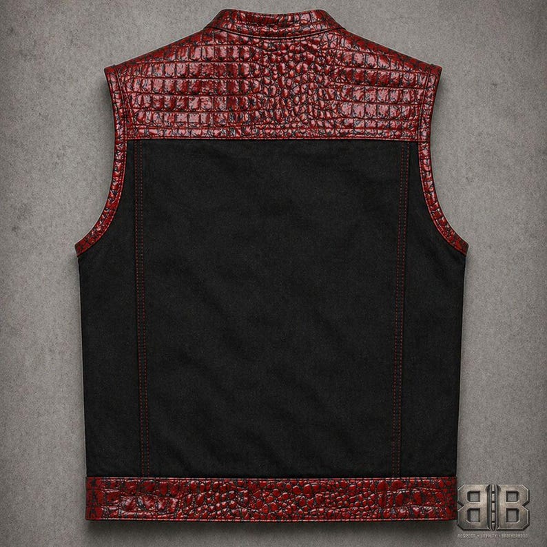 Back view of a black motorcycle vest with red croc-textured shoulder panel, armhole trim and matching bottom band.