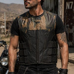 Male rider wearing a black and camouflage motorcycle vest with zip pockets and adjustable side straps beside a motorcycle.