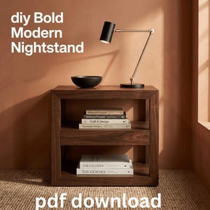 May include: A dark wood nightstand with an open shelf design, featuring a black and gold desk lamp and a black bowl on top. Stacks of books are placed on the middle and bottom shelves. The text "diy Bold Modern Nightstand" and "pdf download" appear.