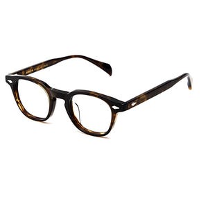 May include: Tortoiseshell-patterned eyeglasses with a rounded frame shape, featuring clear lenses and silver-toned metal accents at the hinges. The frame has a dark brown and amber mottled finish with thin temples and curved ear pieces.