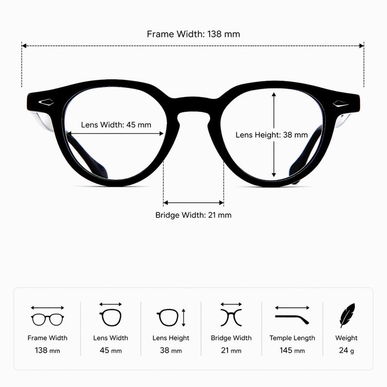 May include: Black round-frame eyeglasses with measurements: frame width 138 mm, lens width 45 mm, lens height 38 mm, bridge width 21 mm, temple length 145 mm, and weight 24 g. The glasses have a classic design.