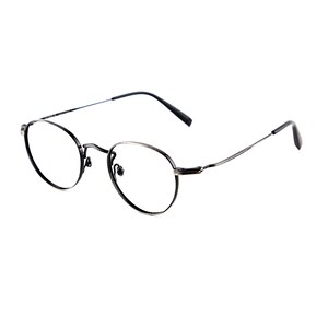 May include: A pair of round eyeglasses with a thin, dark metallic frame. The glasses feature clear lenses, a slender bridge, and thin, straight temples with dark tips, providing a lightweight and simple structure for everyday vision correction.