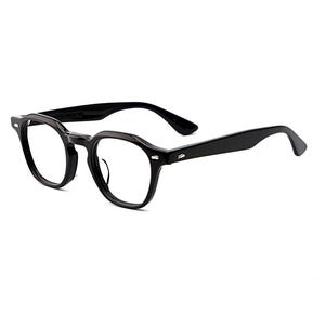 May include: Black eyeglasses with a thick, glossy acetate frame featuring a rounded, slightly angular shape. The glasses have clear lenses, sturdy temples, and small silver-toned metal rivets on the front corners of the frame near the hinges.