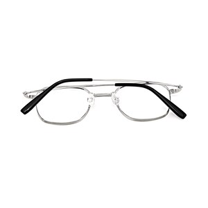 May include: Silver-toned metal eyeglasses featuring a thin, rectangular frame design. The glasses include clear lenses and black plastic temple tips on the ends of the thin metal arms, providing a contrast to the metallic silver finish of the frame.