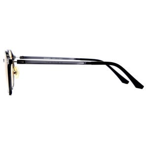 May include: A pair of eyeglasses with a black frame and thin temples viewed from the side. The lenses have a light amber tint, and the frame features gold-toned nose pads. The side of the temple includes small printed text detailing the model.