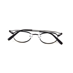 May include: A pair of black metal eyeglasses featuring thin, oval-shaped frames and a slender bridge. The glasses include clear nose pads and black temple arms with curved ends, presented from a rear-facing perspective showing the inner structure.