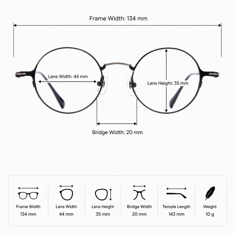 May include: Round black eyeglasses with a frame width of 134 mm, lens width of 44 mm, lens height of 35 mm, bridge width of 20 mm, temple length of 143 mm, and a weight of 10 g. The image includes technical diagrams and labels for these measurements.