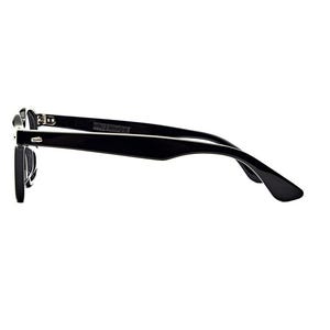 May include: A pair of black-framed eyeglasses shown from a side profile view. The frames feature a glossy black finish with a classic rectangular shape, curved temple arms, and visible silver-toned metal hinges connecting the front to the arms.