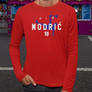 Camiseta de fútbol inspirada en el Mundial de EE. UU. 2026, modelo Air Modrić #10 con estampado animado unisex. imagen 6