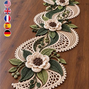 May include: A crochet table runner featuring an S-shaped design with cream-colored lace, dark green leaves, and three-dimensional flowers with cream petals and brown centers. The edges are finished with small cream-colored bobbles.