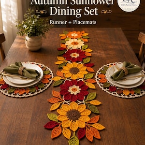 May include: An autumn-themed dining set featuring a crochet table runner and two matching round placemats. The set displays sunflower and leaf motifs in shades of yellow, orange, red, and green. Text reads Autumn Sunflower Dining Set.