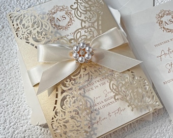 Champagne Laser Cut Wedding Invitations, Ivory Bow, Pearl Brooch, Elegant Monogram Invites