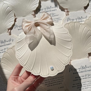 Seashell Cotton Paper Invitations, Embossed Beach Coastal Wedding Invite with Bow