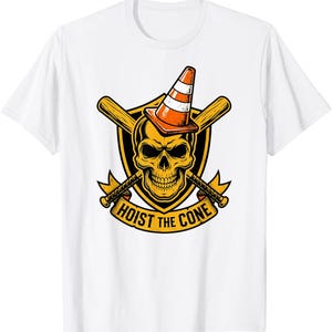 May include: White t-shirt featuring a graphic design with a skull wearing an orange and white traffic cone. The skull is set against a yellow shield with crossed baseball bats and the text "HOIST THE CONE".