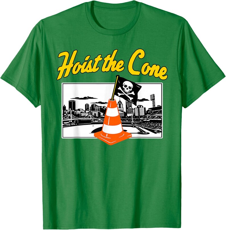 May include: Green t-shirt with the phrase "Hoist the Cone" in yellow lettering. The shirt features a graphic of an orange and white traffic cone with a pirate flag in front of a city skyline.