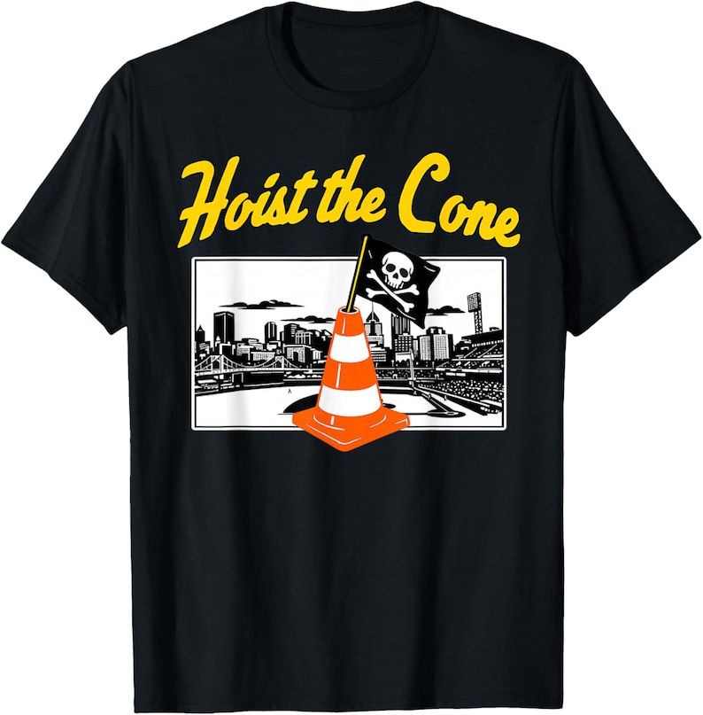 May include: Black t-shirt with the text "Hoist the Cone" in yellow. The shirt features a graphic of an orange traffic cone with a skull and crossbones flag in front of a cityscape.