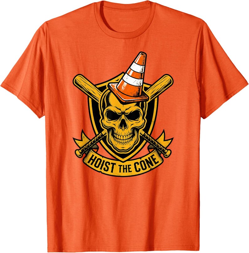 May include: Orange t-shirt featuring a graphic of a skull wearing a traffic cone, with crossed baseball bats behind it. The text "HOIST THE CONE" is displayed on a banner below the skull.