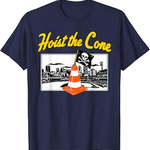 May include: Navy blue t-shirt with the text "Hoist the Cone" in yellow. The graphic features an orange and white traffic cone with a pirate flag in front of a cityscape.