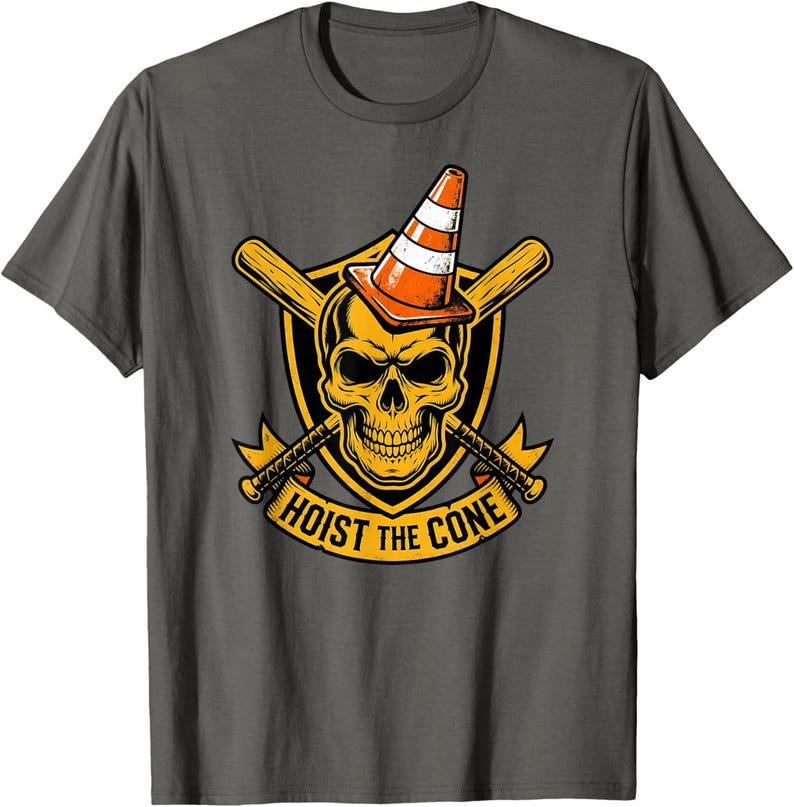 May include: Dark gray t-shirt featuring a graphic design. The design includes a yellow skull wearing an orange and white traffic cone, crossed baseball bats, and the text "HOIST THE CONE" in yellow.