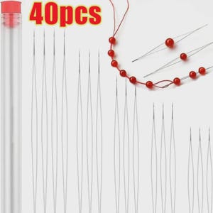 May include: A set of 40pcs long, thin, flexible beading needles with collapsible eyes, accompanied by a clear plastic storage tube with a red cap. Several needles are shown threaded with red beads on a thin red string for demonstration.