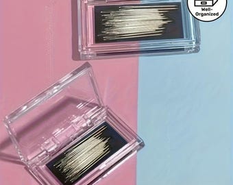 May include: Two clear rectangular plastic cases containing silver sewing needles. Each case features a hinged lid and a black interior insert to hold the needles. A circular logo in the top right corner displays a drawer icon and the text Well-Organized.