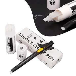 May include: A set of tailor's chalk tools including a white cylindrical container with white chalk sticks, a black mechanical chalk pen with a yellow slider, and a rectangular white box labeled TAILOR'S CHALK with a panda logo graphic.