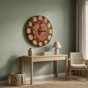 May include: A round wall clock featuring a natural wood grain slice as the face, illuminated by integrated backlighting behind cut-out Roman numerals. The clock has black hour and minute hands and a red second hand, mounted on a light green wall.