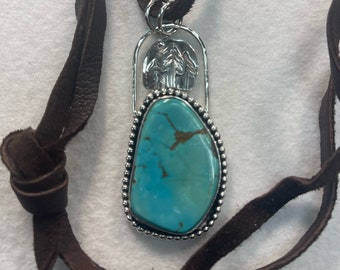 Turquoise pendant with stamped tree design in sterling