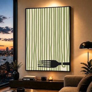 May include: A rectangular wall art print featuring a vertical pattern of sage green and cream-coloured stripes. A solid black silhouette of a four-tined fork is positioned horizontally across the lower section, overlapping the vertical lines.
