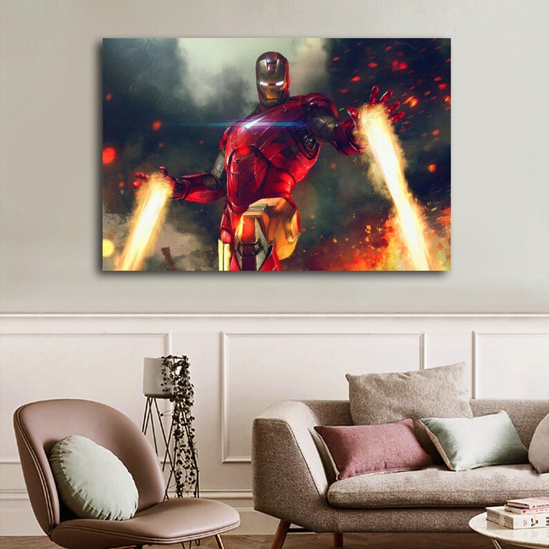 May include: A canvas print of Iron Man in a dynamic pose, clad in a red and gold armored suit. The artwork depicts Iron Man with energy beams emanating from his hands against a backdrop of fiery explosions and a smoky sky.