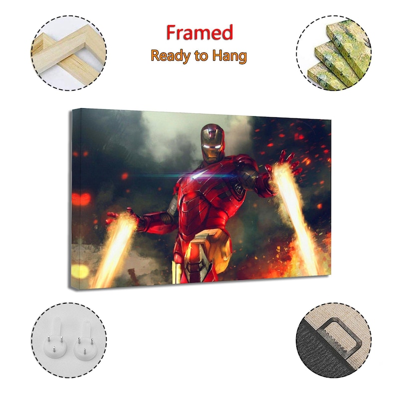 May include: Framed canvas art featuring Iron Man in a dynamic pose, with bright energy beams emanating from his hands. The artwork is predominantly red and gold, set against a smoky, fiery background. Text at the top reads "Framed Ready to Hang."
