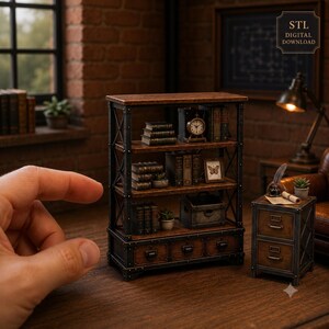 May include: A miniature wooden bookshelf with a dark metal frame and three shelves, featuring small books, a clock, a framed butterfly picture, and three bottom drawers. Beside it sits a matching two-drawer nightstand with a quill and scroll.