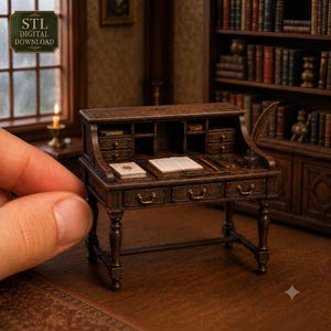 May include: A miniature dark wood roll-top desk featuring multiple small drawers, a central writing surface with an open book, a quill pen, and an inkwell. The desk includes a label in the upper corner that reads STL DIGITAL DOWNLOAD.