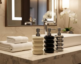 Moderno dispenser di sapone a forma di ciambella / flacone in ceramica ricaricabile per lozioni e shampoo