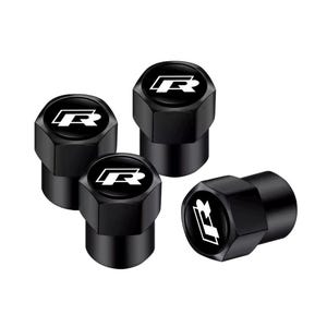 Może przedstawiać: Zestaw trzech ceramicznych kubków z nakrapianym, matowym wykończeniem w kolorze kremowym, szarym i czarnym. Każdy kubek ma zaokrąglony kształt i prosty, nowoczesny design, odpowiedni do kawy lub herbaty.