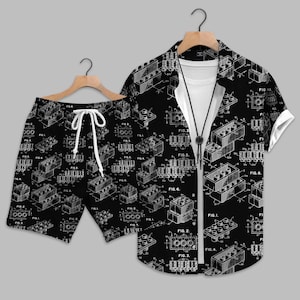 May include: A black short-sleeved button-down shirt and matching shorts set featuring a white technical line drawing print of building blocks. The shirt has a white collar and a black cord necklace, while the shorts include a white drawstring.