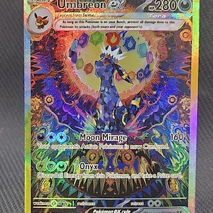 May include: A holographic Umbreon ex trading card with a stained-glass aesthetic. The card features the character Umbreon, 280 HP, and the attacks Moon Mirage and Onyx. The artwork displays a vibrant, multi-colored background with intricate patterns.
