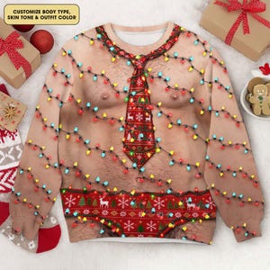 May include: A long-sleeve sweatshirt featuring a realistic print of a bare chest with body hair, adorned with a string of colourful Christmas lights. A red necktie and a red waistband with white snowflake and reindeer patterns are printed on the front.
