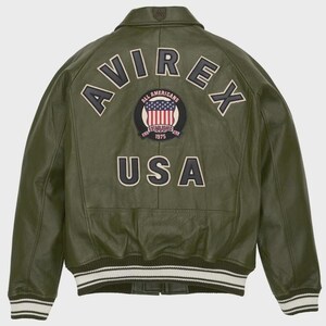 May include: Olive green leather jacket with the word "AVIREX" arched across the back, above a circular patch with the American flag and the words "ALL AMERICANS ESTABLISHED 1975". The word "USA" is below the patch. The jacket has white and black striped cuffs.