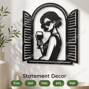 May include: Black metal wall art showing a woman in sunglasses holding a wine glass, framed by a window with shutters. The text "Statement Decor" is below the image, along with file type icons: SVG, DXF, PNG, EPS, and PDF.