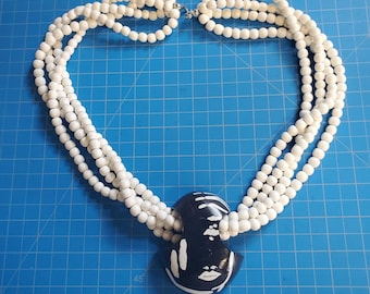 Wooden Beaded Multi-Strand Necklace With Art Deco Wooden Face Pendant 26"