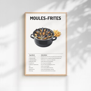 May include: A framed print featuring a recipe for Moules-Frites. The image shows a black pot filled with mussels, a side of fries, and the recipe's ingredients and instructions. The title "MOULES-FRITES" is at the top.