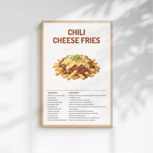 May include: A framed poster with the words "CHILI CHEESE FRIES" in brown letters. The image shows a serving of chili cheese fries topped with green onions. Below the image are the ingredients and instructions for the recipe.