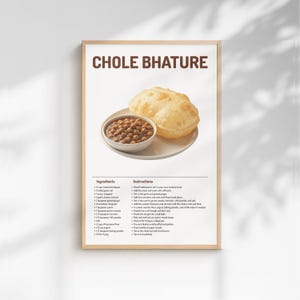May include: A framed print with a recipe for Chole Bhature. The image shows a plate with a bowl of chickpeas and a large, puffy bread. The recipe includes ingredients and instructions. The title "CHOLE BHATURE" is at the top of the print.