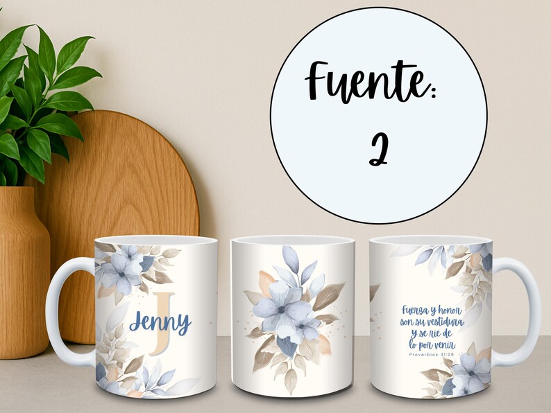 May include: White ceramic mug featuring a floral design with blue and beige watercolor flowers and leaves. The mug has the name "Jenny" and a large initial "J". The mug also has a bible verse in Spanish.