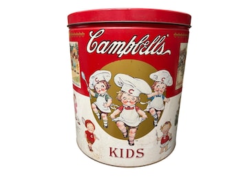 Lata vintage de palomitas de maíz Campbell's Kids Party Pac, recipiente de almacenamiento de metal rojo y blanco.
